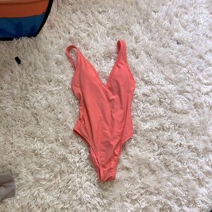 Cute Peach one- piece with an open back